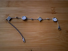 Load image into Gallery viewer, White on Silver Flowers Bracelet
